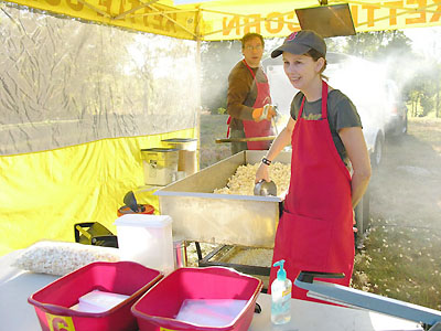 Velma in a kettle corn business tent